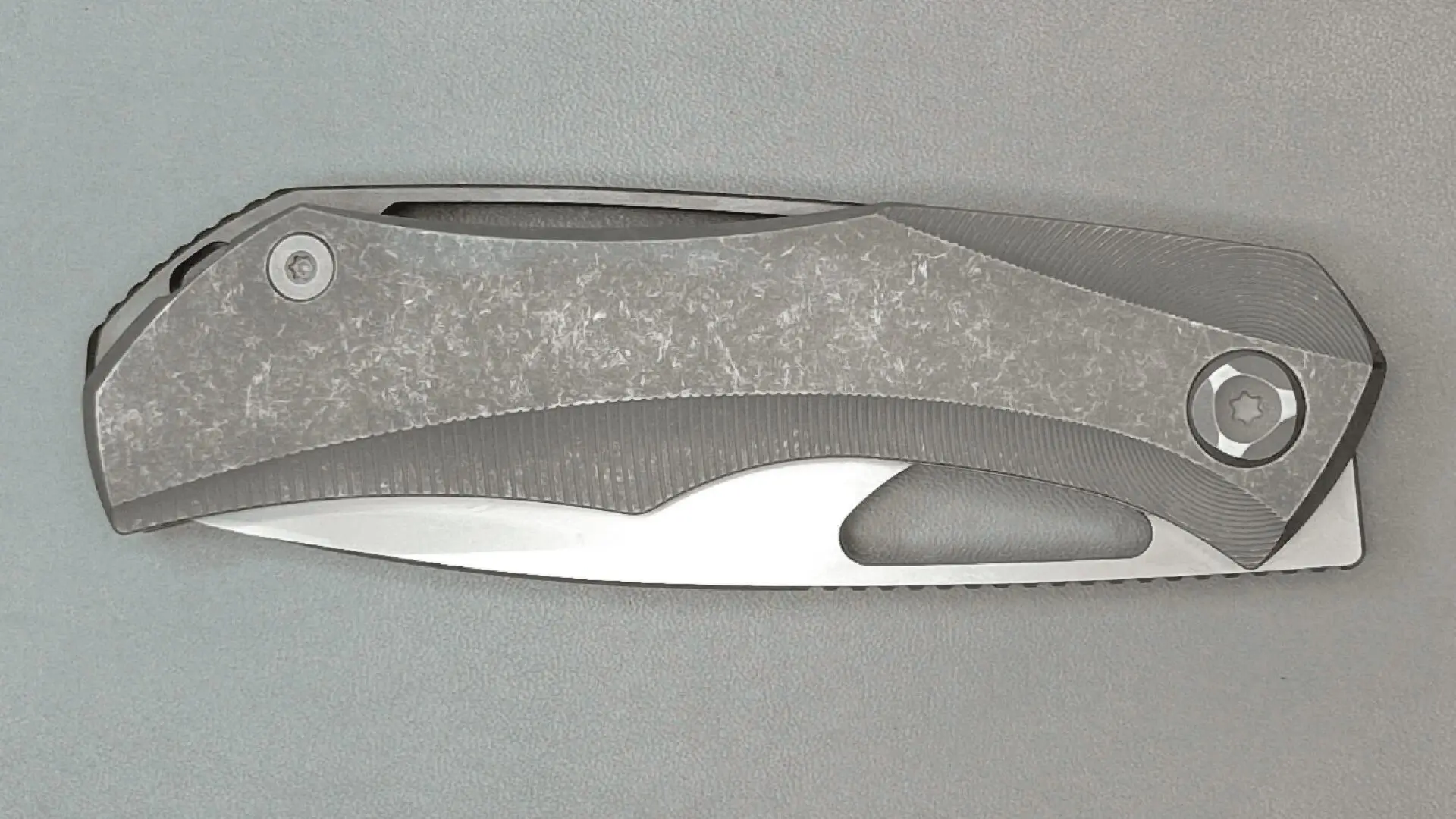 Modern stainless steel kitchen knives with ergonomic handles.