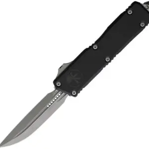 A sleek black automatic folding knife with a sharp blade.