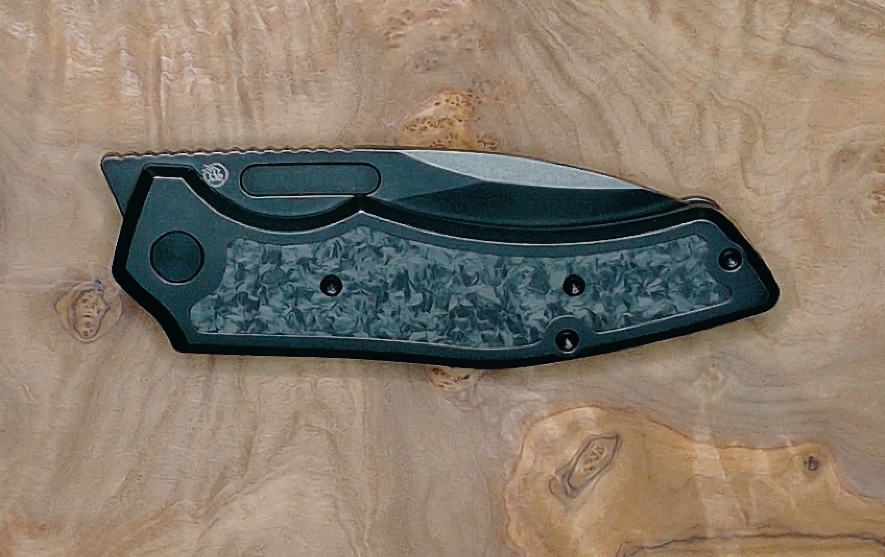 Marble carbon fiber inlay detail on Griffin Company Scout F3.5 handle