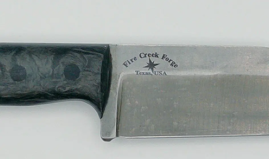 Fire Creek Forge Texas USA maker stamp on Buckthorn Wharncliffe blade with Dark Matter handle
