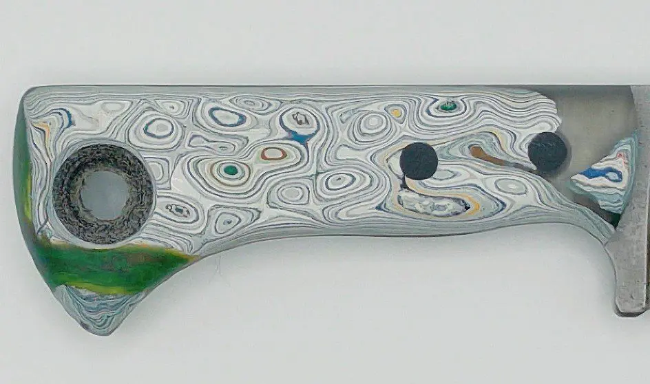 Fire Creek Forge Buckthorn Wharncliffe fordite resin handle, back side detail