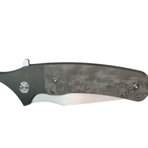 A folding knife with skull-themed handle design.
