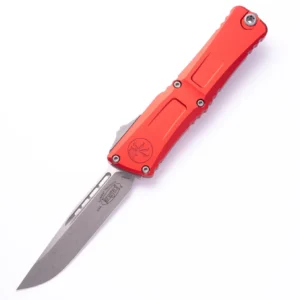 A red-handled folding knife with a sharp blade.