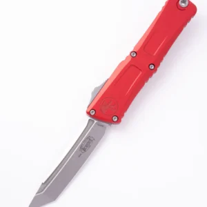 Red automatic knife with a sharp blade.