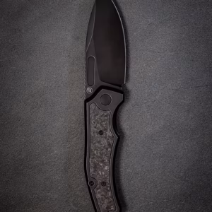 Scout F3.5 left handed titanium MagnaCut folding knife with marble carbon fiber inlays
