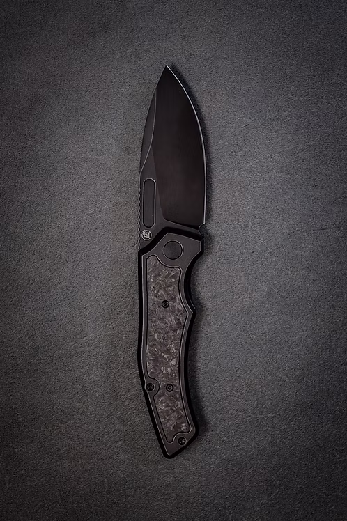 Scout F3.5 left handed titanium MagnaCut folding knife with marble carbon fiber inlays