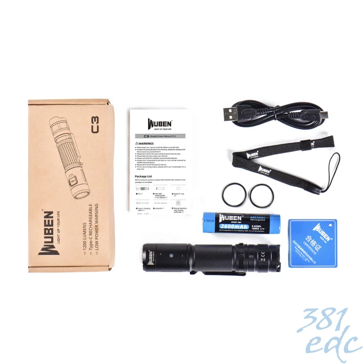 Wuben C3 what's in the box — flashlight, 2600mAh 18650 battery, USB-C cable, spare O-rings, lanyard, and manual